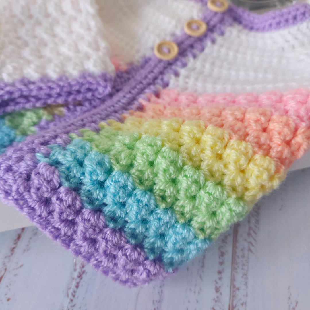 Handmade Handmade Crochet Rainbow Baby Cardigan – Sizes Newborn to 24 Months | Newborn Gift – Baby Toddler Cardigans crafted in soft acrylic yarn and available in multiple colours by Twisted by the Sea.