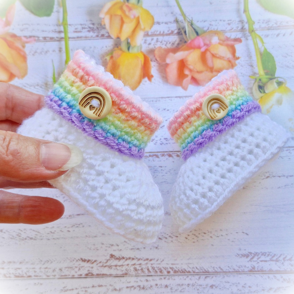 Handmade Rainbow Baby Crochet Booties, Gender Neutral Keepsake Gift – Baby Booties crafted in soft acrylic yarn and available in multiple colours by Twisted by the Sea.
