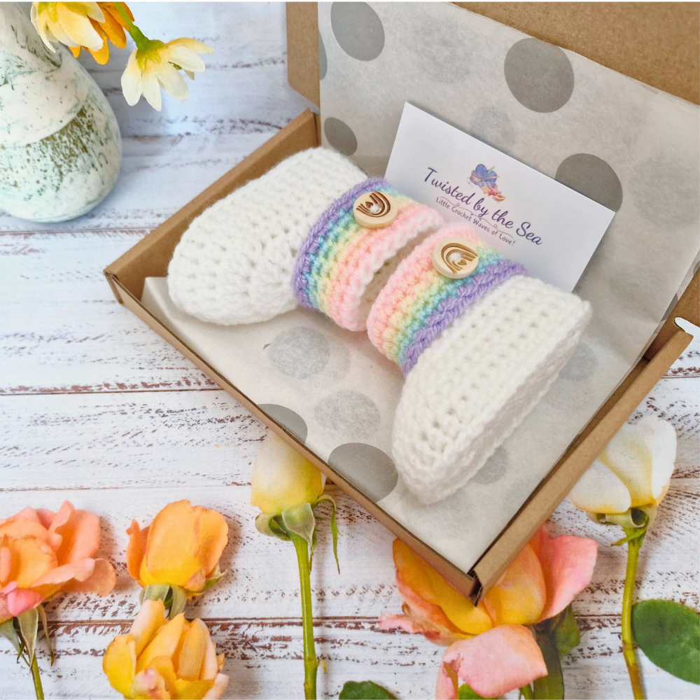 Handmade Rainbow Baby Crochet Booties, Gender Neutral Keepsake Gift – Baby Booties crafted in soft acrylic yarn and available in multiple colours by Twisted by the Sea.