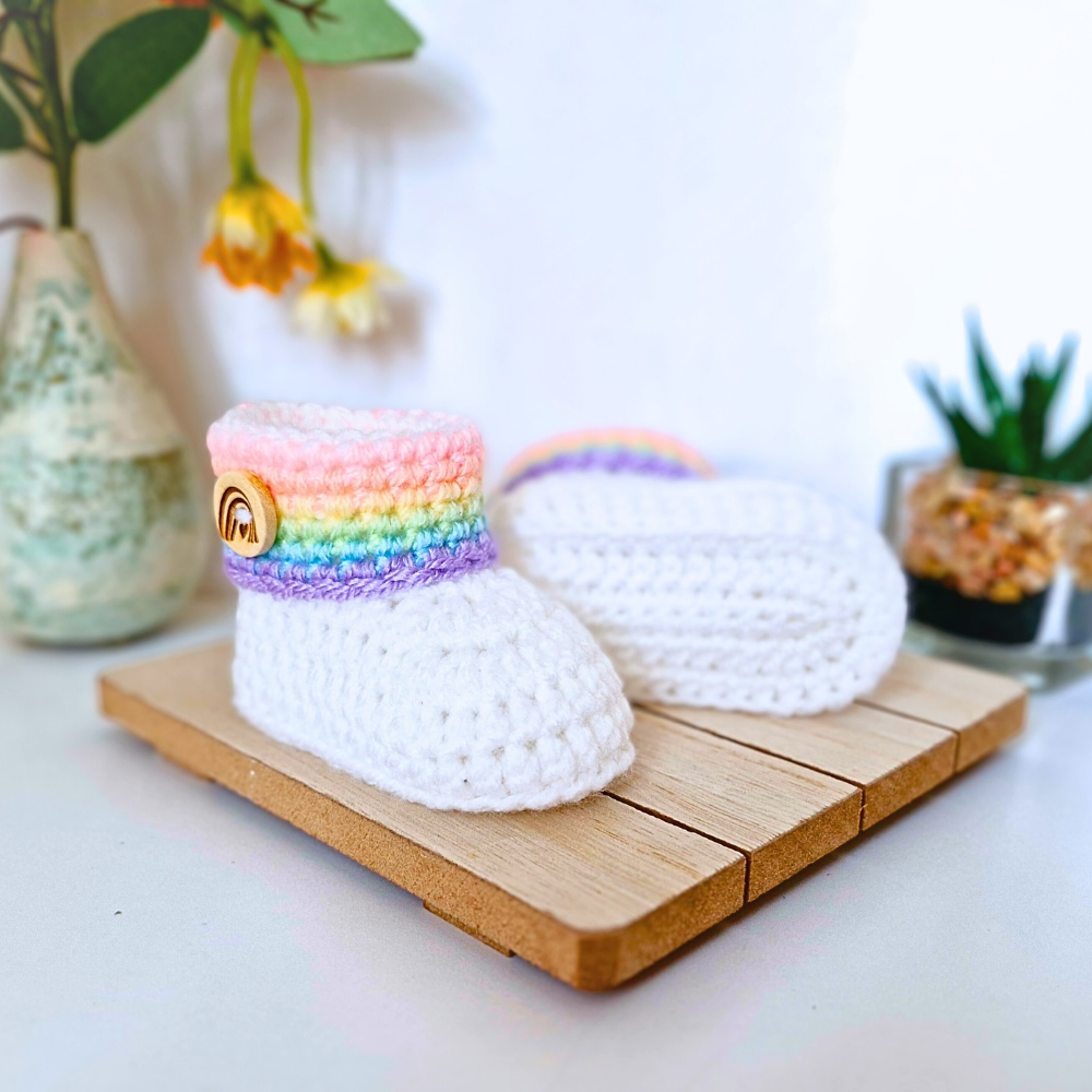 Handmade Rainbow Baby Crochet Booties, Gender Neutral Keepsake Gift – Baby Booties crafted in soft acrylic yarn and available in multiple colours by Twisted by the Sea.