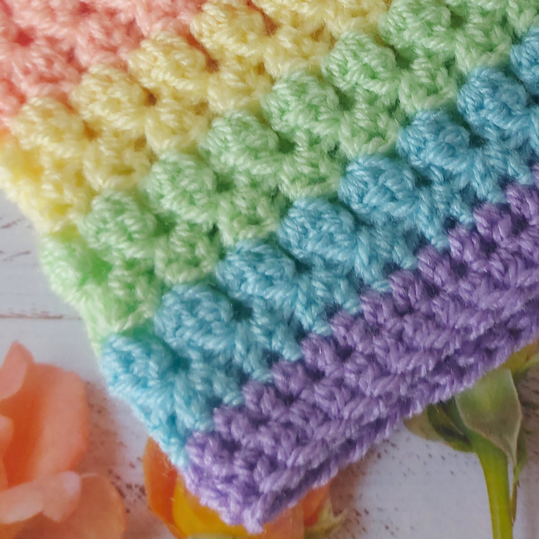 Handmade Handmade Crochet Rainbow Baby Cardigan – Sizes Newborn to 24 Months | Newborn Gift – Baby Toddler Cardigans crafted in soft acrylic yarn and available in multiple colours by Twisted by the Sea.