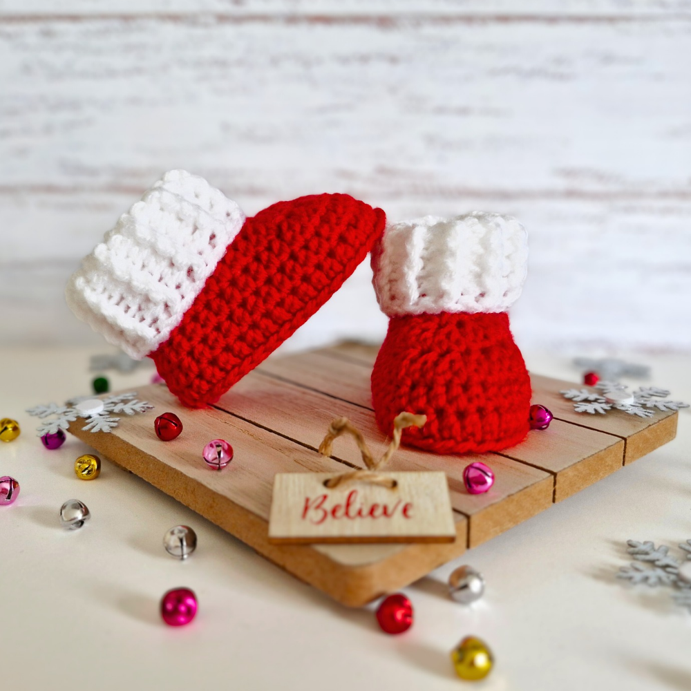 Handmade Handmade Red & White Christmas Crochet Baby Booties – Newborn to 6 Months – Baby Booties crafted in soft acrylic yarn and available in multiple colours by Twisted by the Sea.