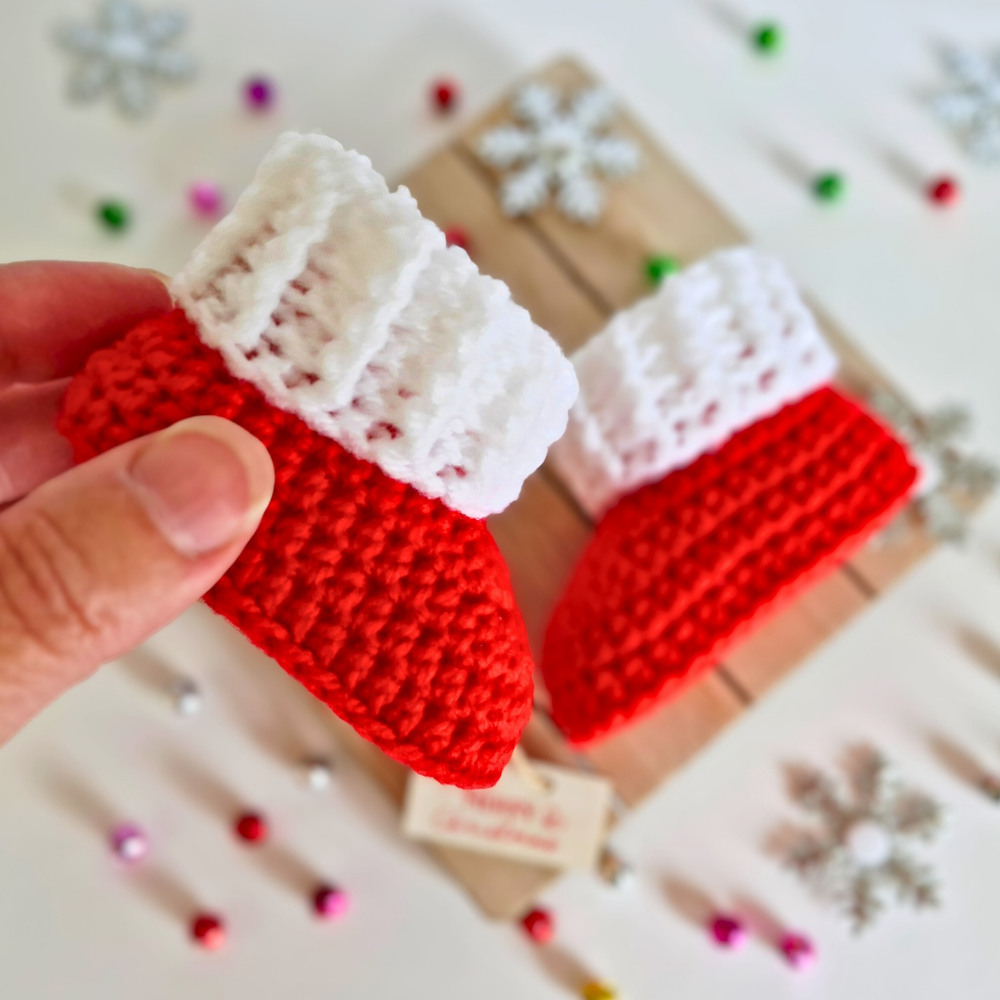 Handmade Handmade Christmas Baby Hat & Bootie Set – Red and White (Newborn to 6 Months) – Hat and Bootie Set crafted in soft acrylic yarn and available in multiple colours by Twisted by the Sea.