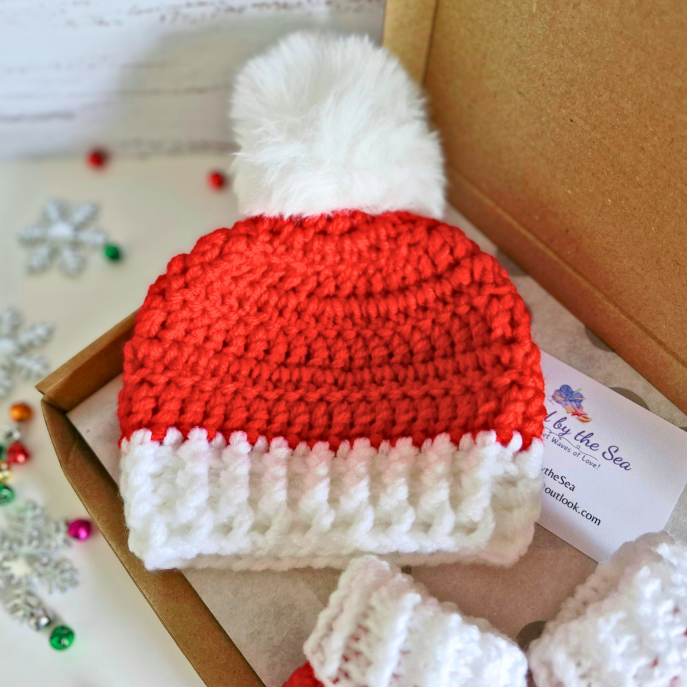 Handmade Handmade Christmas Baby Hat & Bootie Set – Red and White (Newborn to 6 Months) – Hat and Bootie Set crafted in soft acrylic yarn and available in multiple colours by Twisted by the Sea.