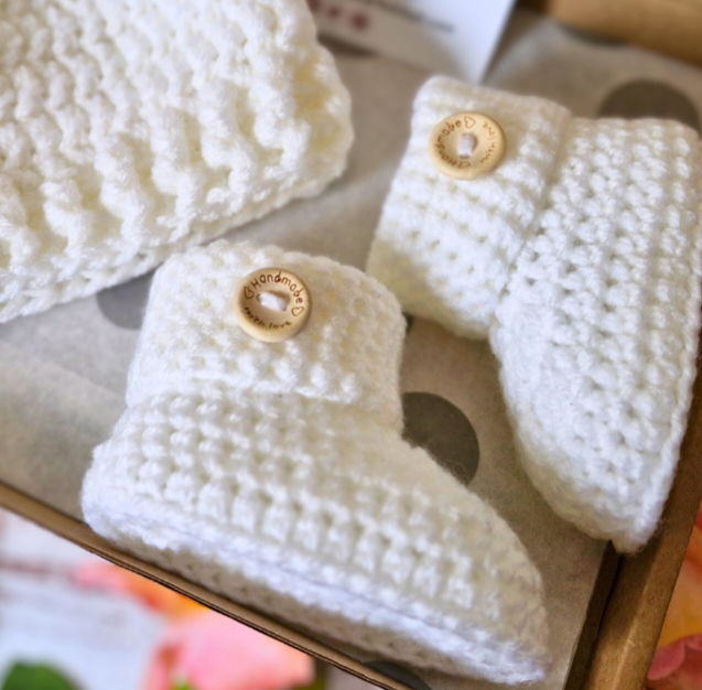 Handmade Crochet Baby Booties – Soft and Cosy Handmade Shoes for Newborns – Baby Booties crafted in soft acrylic yarn and available in multiple colours by Twisted by the Sea.