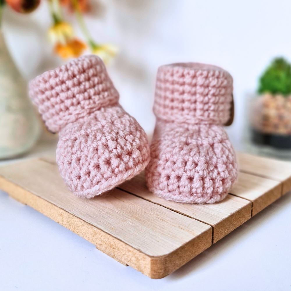 Handmade Hello World Crochet Baby Booties – Handmade 0-6 Months Gift – Baby Booties crafted in soft acrylic yarn and available in multiple colours by Twisted by the Sea.