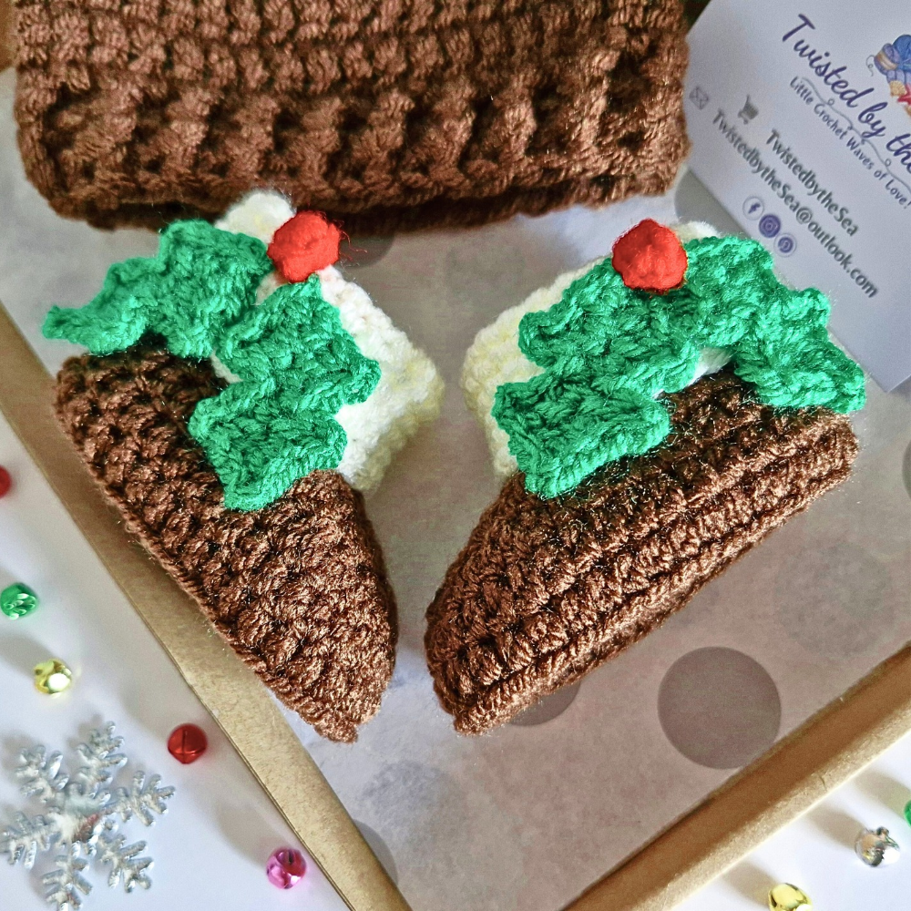 Handmade Christmas Pudding Baby Booties – Handmade Crochet Gift for Newborns – Baby Booties crafted in soft acrylic yarn and available in multiple colours by Twisted by the Sea.