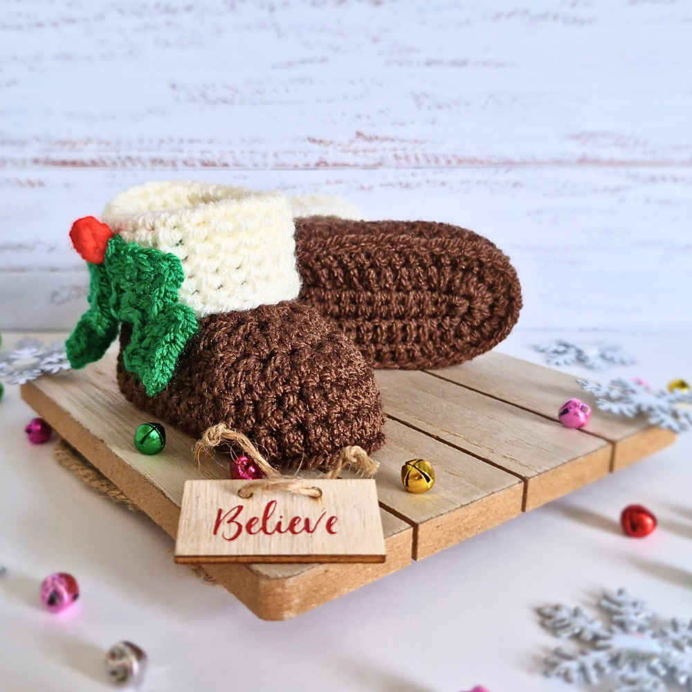 Handmade Christmas Pudding Baby Booties – Handmade Crochet Gift for Newborns – Baby Booties crafted in soft acrylic yarn and available in multiple colours by Twisted by the Sea.