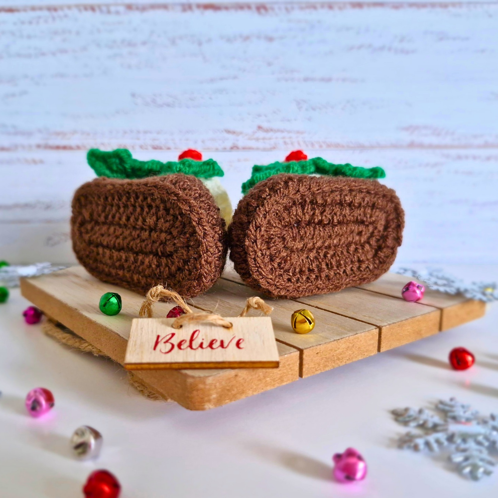 Handmade Christmas Pudding Baby Booties – Handmade Crochet Gift for Newborns – Baby Booties crafted in soft acrylic yarn and available in multiple colours by Twisted by the Sea.
