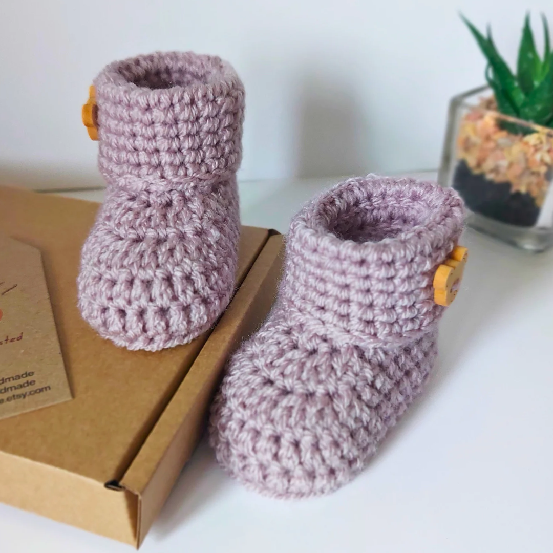 Handmade Handmade Crochet Baby Booties with Teddy Button - Sizes Newborn, 0-3 and 3-6 Months – Baby Booties crafted in soft acrylic yarn and available in multiple colours by Twisted by the Sea.