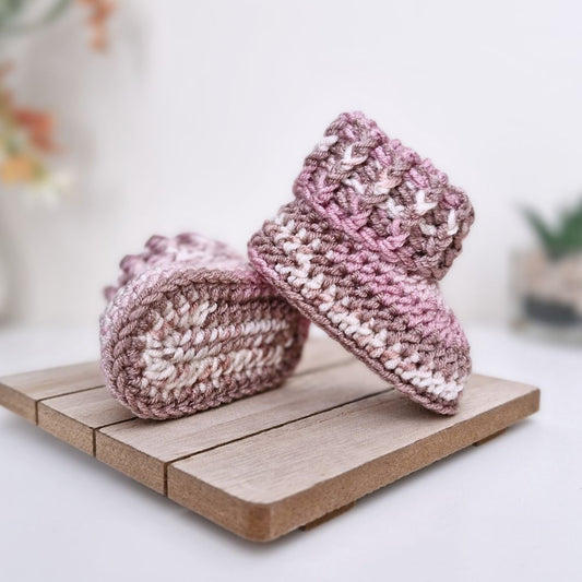 Stylecraft Bambino Prints: shade Ring A Roses made into a pair of newborn-sized baby booties