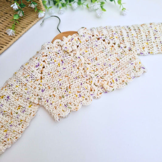 Handmade crochet baby bolero in Stylecraft Bambino Dotty shade Chuckle