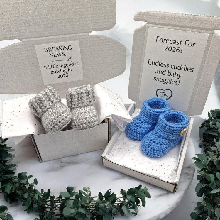 Pregnancy announcement gift boxes including handmade crochet baby booties