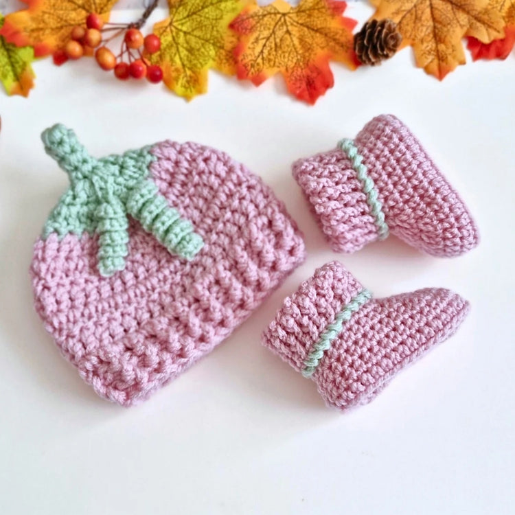 A collection of summerween crochet baby booties and hats all pumpkin inspired