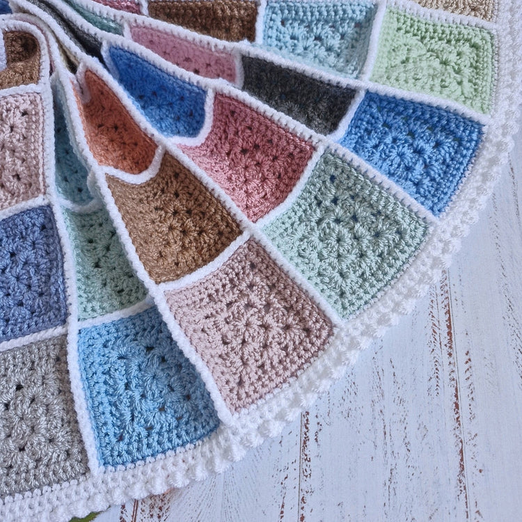 Patchwork granny square crochet baby blanket - perfect new baby gift