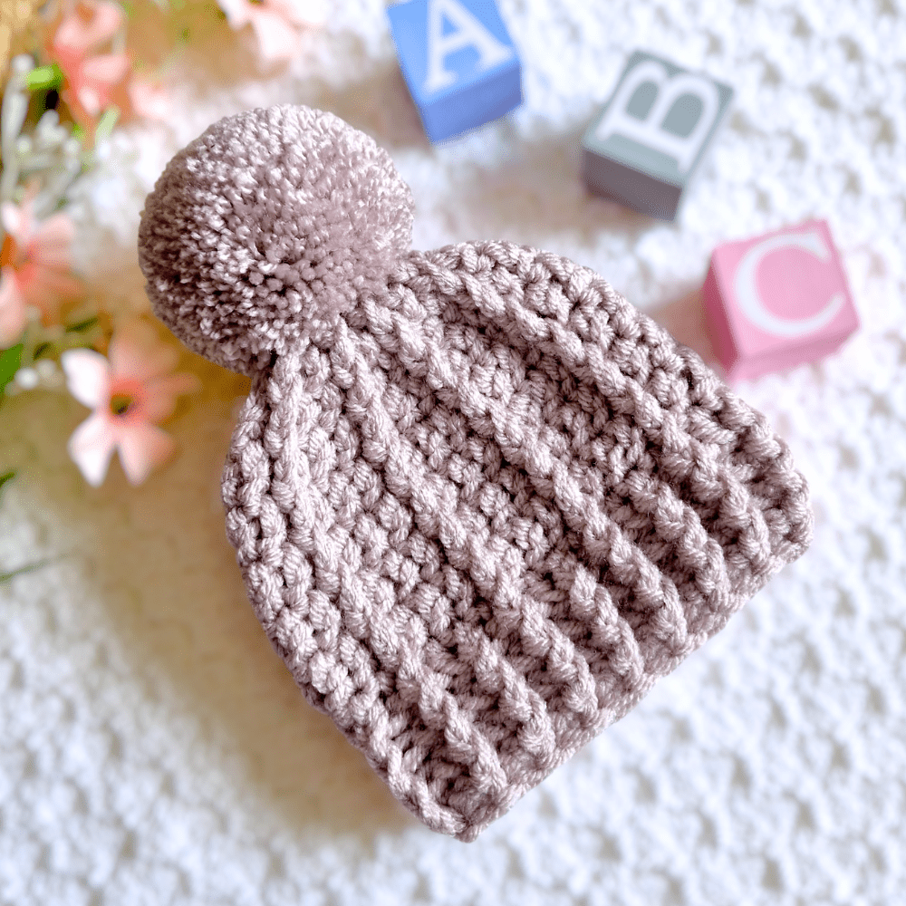 Keep baby's head cosy in style with our soft crochet hats. Handmade to order in sizes newborn to 2 yrs. Dispatches in 5–7 days.