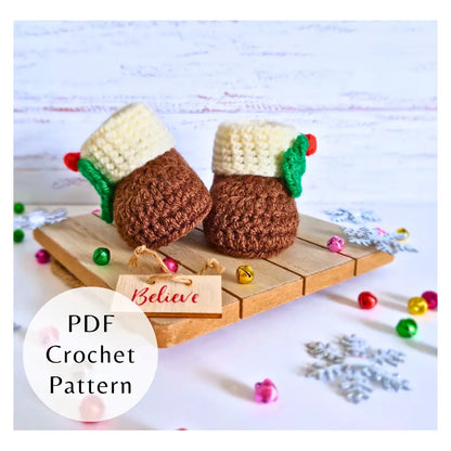 Handmade crochet Christmas pudding plush with green holly and red berries, festive DIY pattern