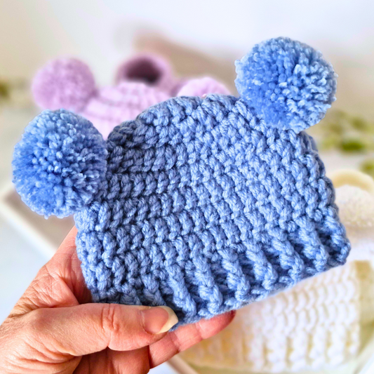 Handmade Handmade Crochet Double Pom Pom Baby Hat – Newborn to 12 Months – Beanie Hat crafted in soft acrylic yarn and available in multiple colours by Twisted by the Sea.