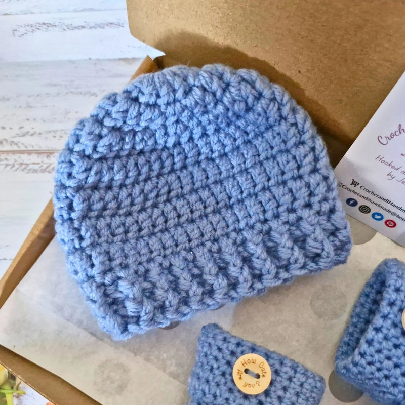 Handmade Handmade Crochet Baby Gift Set – Beanie Hat & Booties with Cute Button Detail (Newborn to 6 Months) – Hat and Bootie Set crafted in soft acrylic yarn and available in multiple colours by Twisted by the Sea.