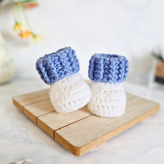 Handmade Crochet Cuffed Baby Booties – Newborn to 6 Months – Baby Booties crafted in soft acrylic yarn and available in multiple colours by Twisted by the Sea.