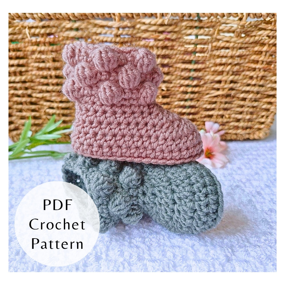Handmade crochet pattern for bobble baby booties by Twisted by the Sea. Digital PDF download featuring US crochet terms and step-by-step photos.