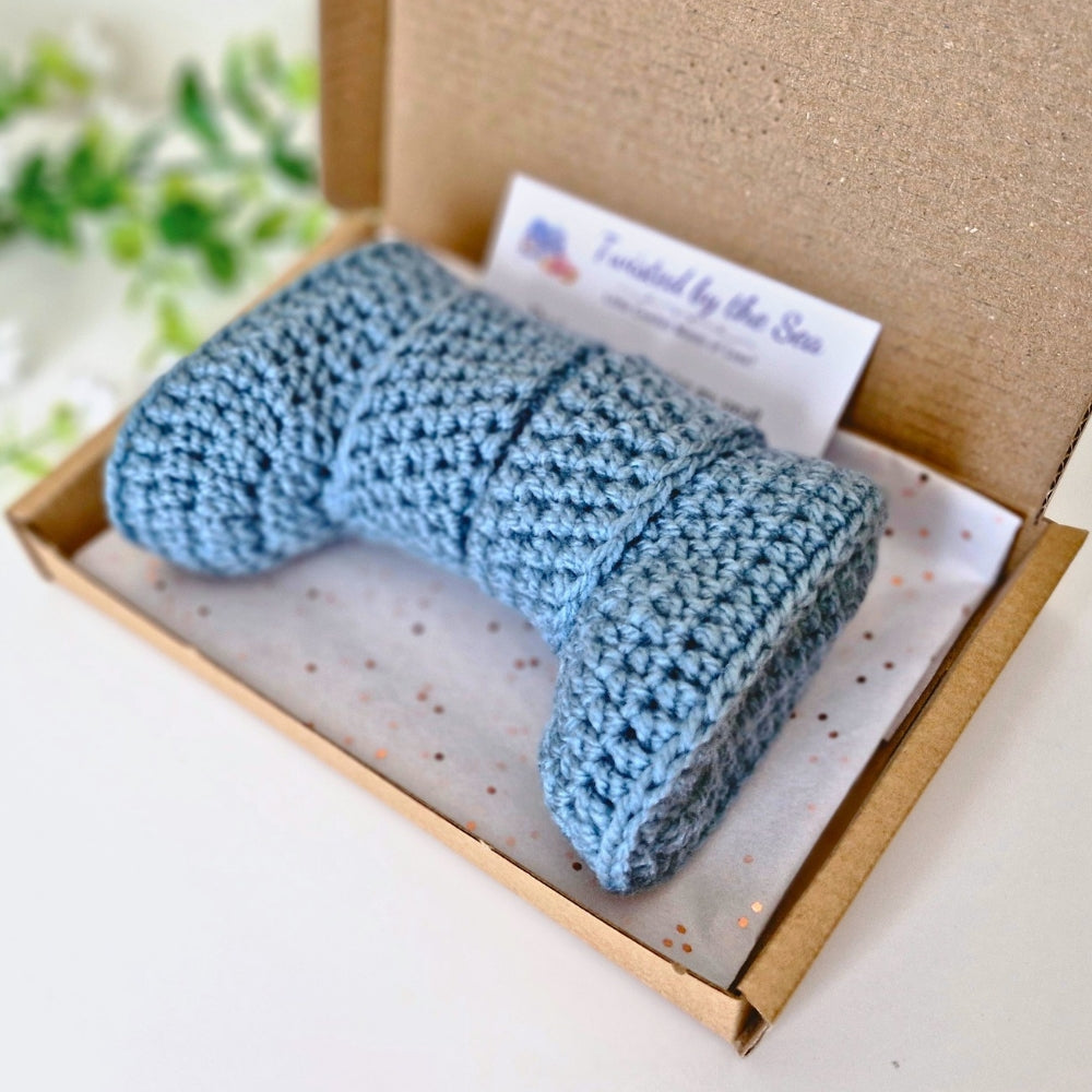 north sea blue newborn crochet baby booties in a postage box