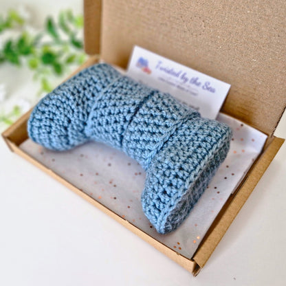north sea blue newborn crochet baby booties in a postage box