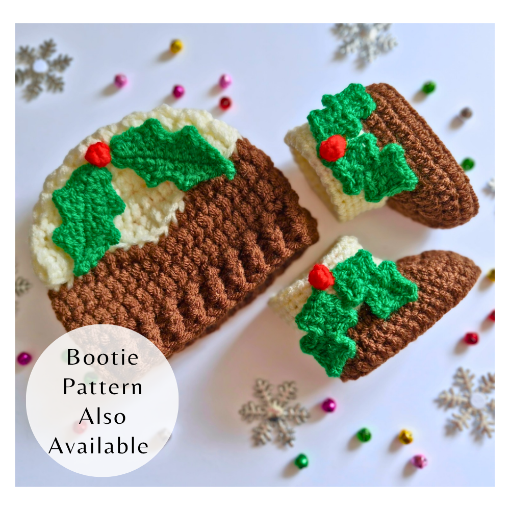 Festive crochet Christmas pudding baby hat and booties set with holly berries. Two-pattern PDF bundle by Twisted by the Sea.
