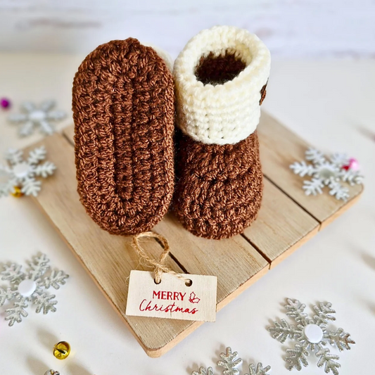 Handmade Crochet Christmas Baby Gift Set – Pudding Hat & Booties for Newborn to 6 Months – Hat and Bootie Set crafted in soft acrylic yarn and available in multiple colours by Twisted by the Sea.