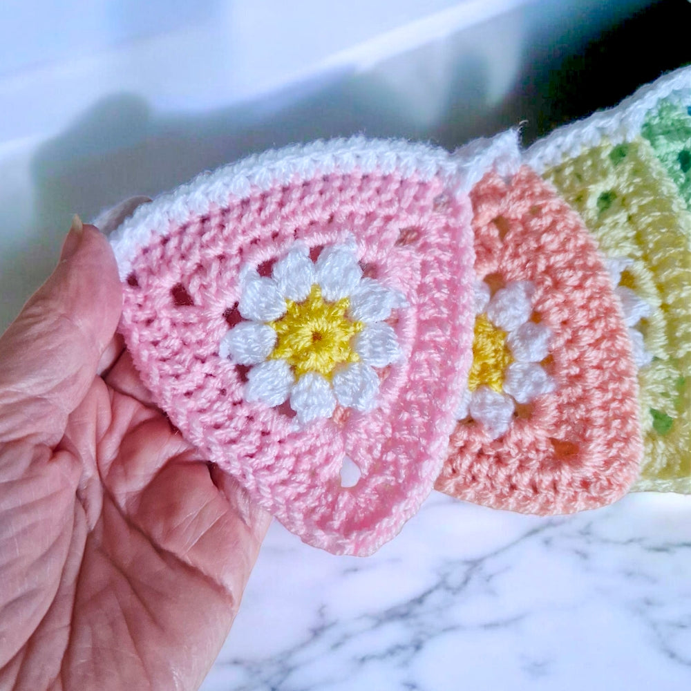 Close-up rainbow crochet bunting, ready-to-order for nursery décor - Twisted by the Sea 