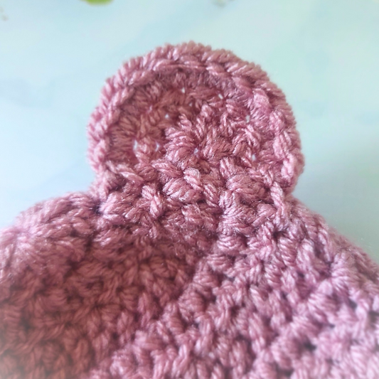 Handmade Handmade Crochet Teddy Bear Baby Hat – Cosy Newborn Beanie in Sizes to 6 Months – Beanie Hat crafted in soft acrylic yarn and available in multiple colours by Twisted by the Sea.