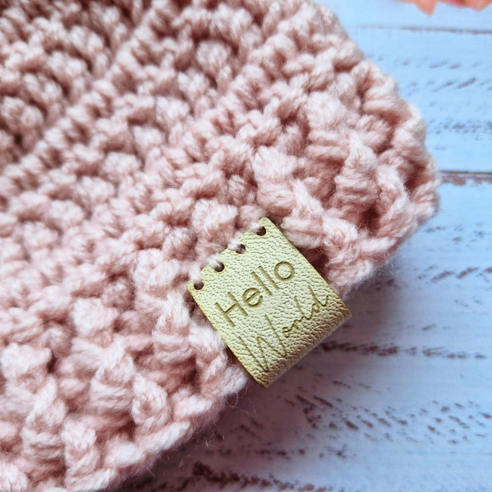 Handmade Hello World Chunky Crochet Pom-Pom Baby Hat – Handmade Winter Beanie – Pom Pom Hat crafted in soft acrylic yarn and available in multiple colours by Twisted by the Sea.
