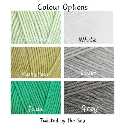 Six yarn color swatches labeled Tea Green, White, Mushy Peas, Silver, Jade, and Grey for knitting