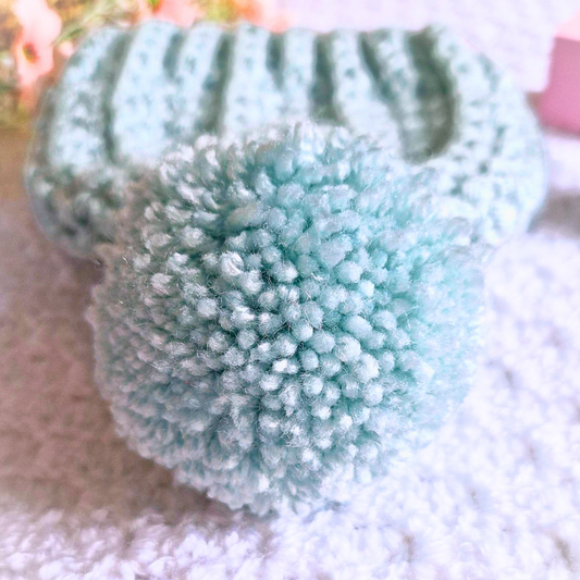 Handmade Handmade Crochet Pom Pom Baby Hat – Newborn to 12 Months – Beanie Hat crafted in soft acrylic yarn and available in multiple colours by Twisted by the Sea.