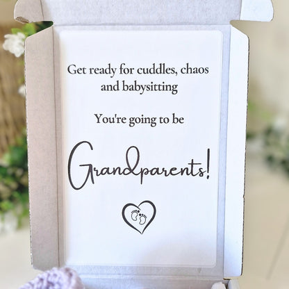 Card with text 'Get ready for cuddles, chaos and babysitting. You're going to be grandparents!' on a blurred background.