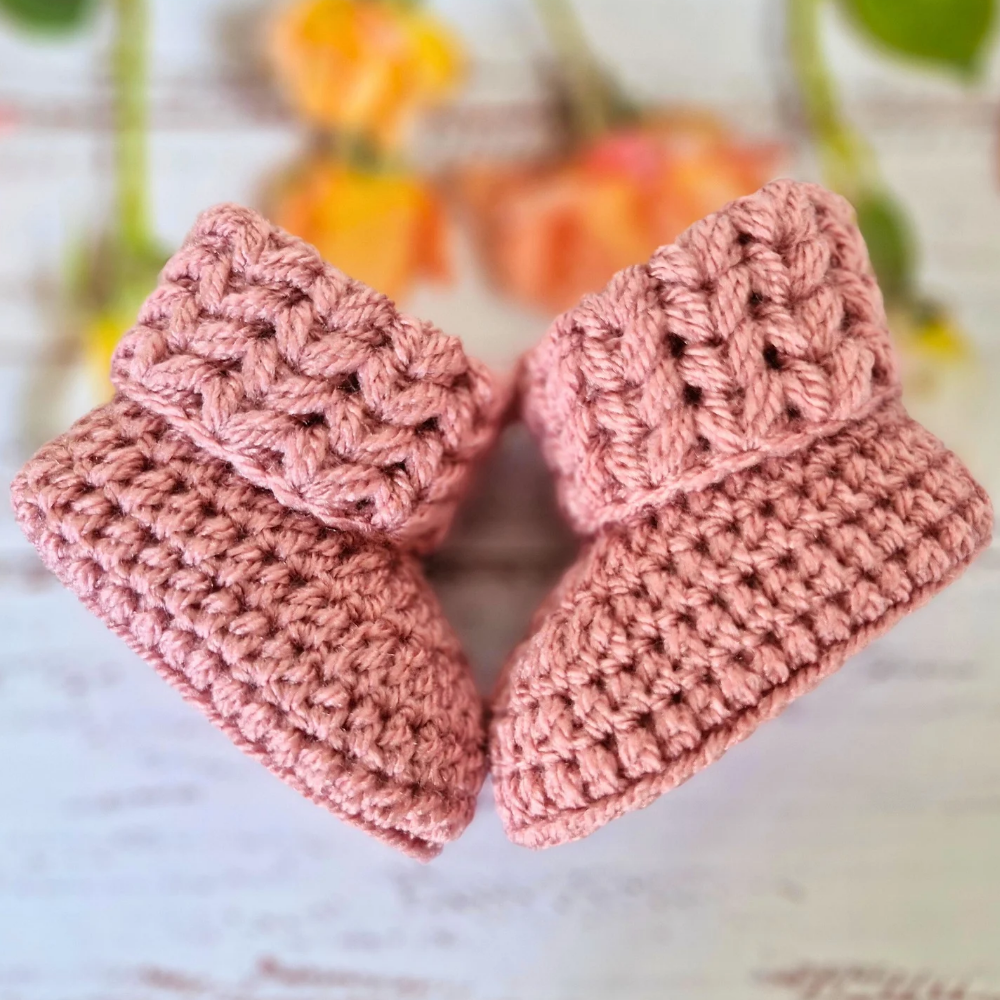 Handmade Handmade Crochet Baby Booties – Newborn to 6 Months | Baby Shower Gift – Baby Booties crafted in soft acrylic yarn and available in multiple colours by Twisted by the Sea.