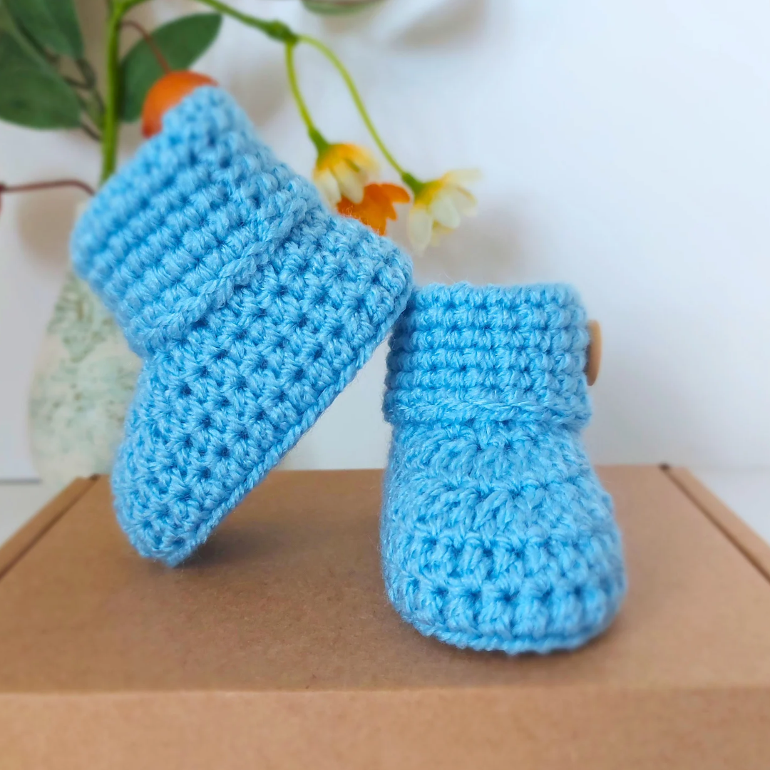 Handmade Soft Crochet Baby Booties – ‘It’s a Boy’ Newborn Shoes & Baby Shower Gift – Baby Booties crafted in soft acrylic yarn and available in multiple colours by Twisted by the Sea.
