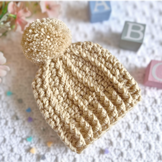 Handmade Handmade Crochet Pom Pom Baby Hat – Newborn to 12 Months – Beanie Hat crafted in soft acrylic yarn and available in multiple colours by Twisted by the Sea.