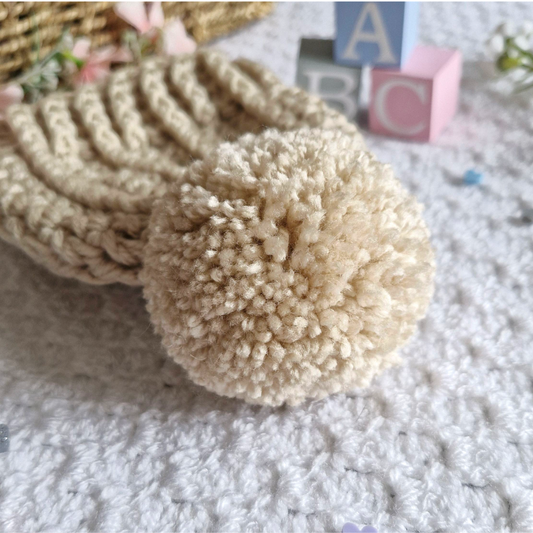 Handmade Handmade Crochet Pom Pom Baby Hat – Newborn to 12 Months – Beanie Hat crafted in soft acrylic yarn and available in multiple colours by Twisted by the Sea.