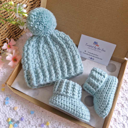 Handmade Newborn Baby Gift Set – Handmade Crochet Hat with Matching Booties – crafted in soft acrylic yarn and available in multiple colours by Twisted by the Sea.