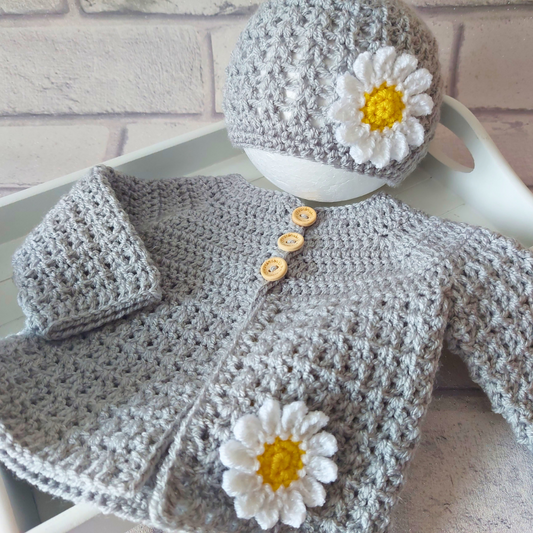 Handmade Crochet Hat and Cardigan Daisy Set, 12 to 24 Months – Hat and Cardigan Set crafted in soft acrylic yarn and available in multiple colours by Twisted by the Sea.