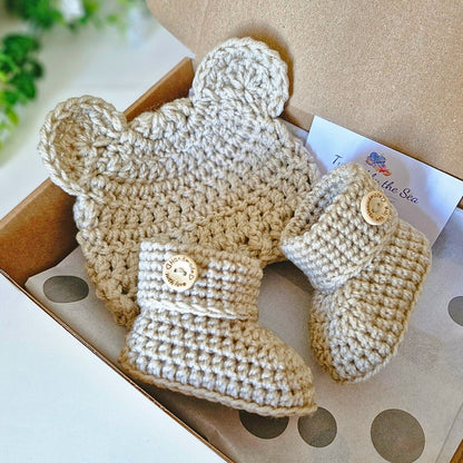 Crochet newborn baby hat and booties gift set with a bear design in a box