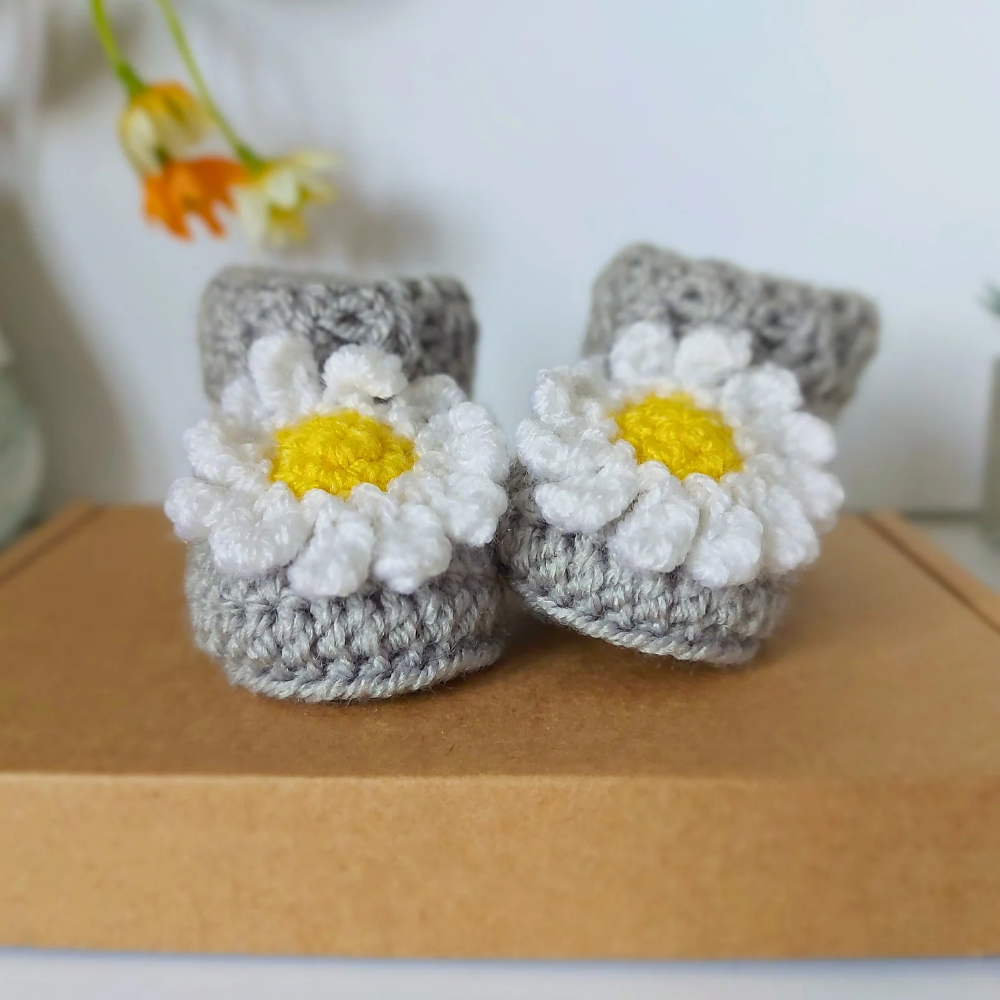Handmade Handmade Daisy Crochet Baby Booties – Baby Booties crafted in soft acrylic yarn and available in multiple colours by Twisted by the Sea.