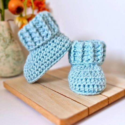 Handmade Baby Booties Crochet With Ridged Cuff – Baby Booties crafted in soft acrylic yarn and available in multiple colours by Twisted by the Sea.