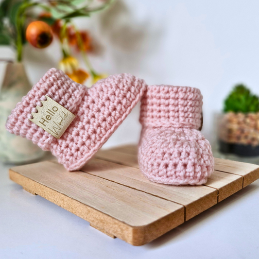 Handmade Hello World Crochet Baby Booties – Handmade 0-6 Months Gift – Baby Booties crafted in soft acrylic yarn and available in multiple colours by Twisted by the Sea.