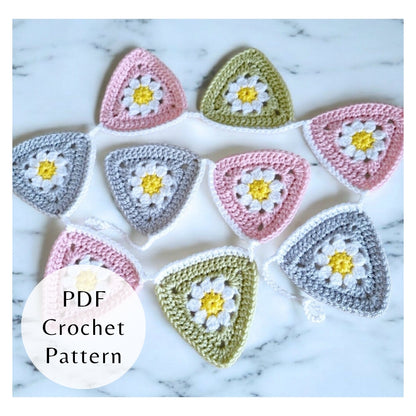 Colorful crochet patterns with floral designs on a marble background, featuring text 'PDF Crochet Pattern'.
