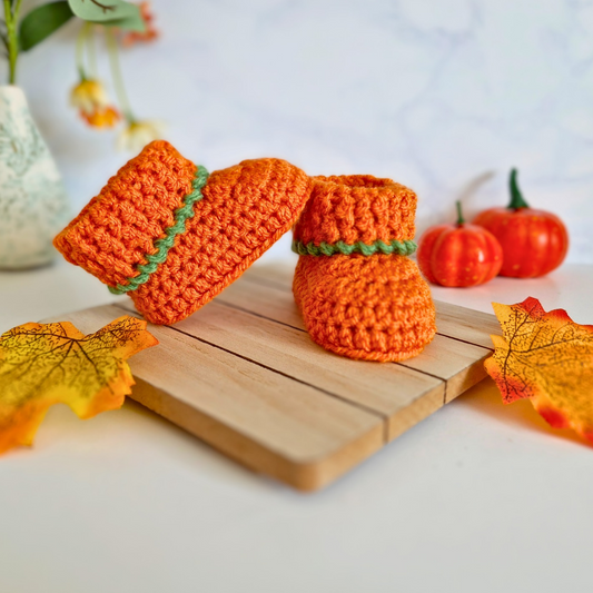 Handmade Handmade Pumpkin Crochet Baby Booties – Baby Booties crafted in soft acrylic yarn and available in multiple colours by Twisted by the Sea.