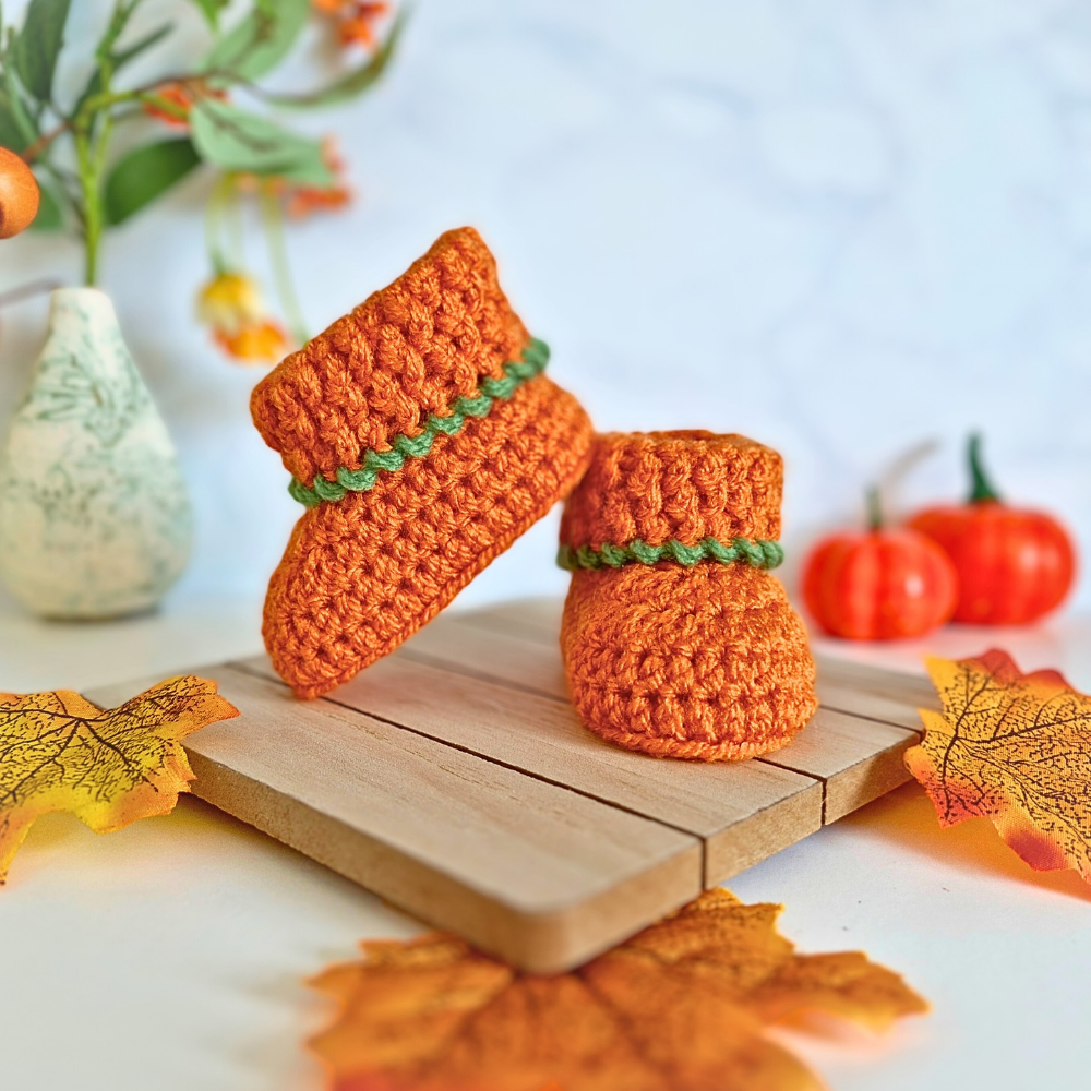 Handmade Handmade Pumpkin Crochet Baby Booties – Baby Booties crafted in soft acrylic yarn and available in multiple colours by Twisted by the Sea.