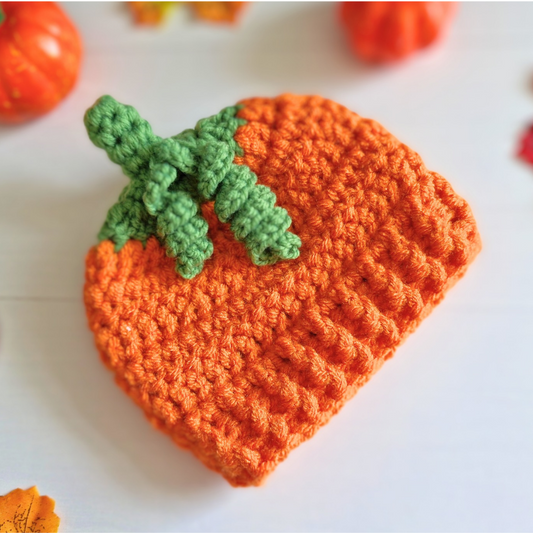 Handmade Handmade Crochet Pumpkin Baby Hat – Autumn Baby Gift – Beanie Hat crafted in soft acrylic yarn and available in multiple colours by Twisted by the Sea.