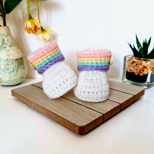 Handmade Rainbow Baby Crochet Booties, Gender Neutral Keepsake Gift – Baby Booties crafted in soft acrylic yarn and available in multiple colours by Twisted by the Sea.